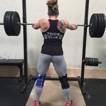 Tracey strength training during her CrossFit years